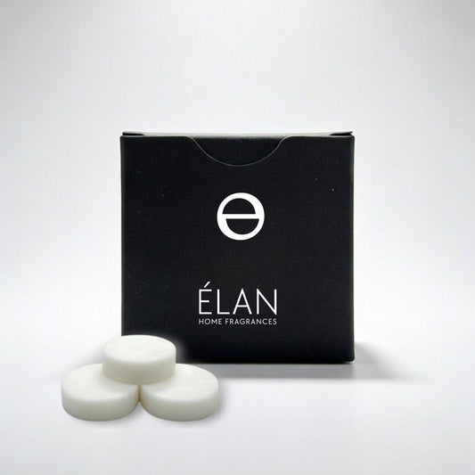 Black box of 3 ÉLAN home fragrances wax melts on a light gray background