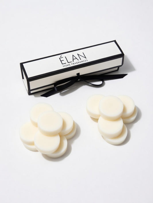 White melts with 'Elan' branded packaging on a light gray background